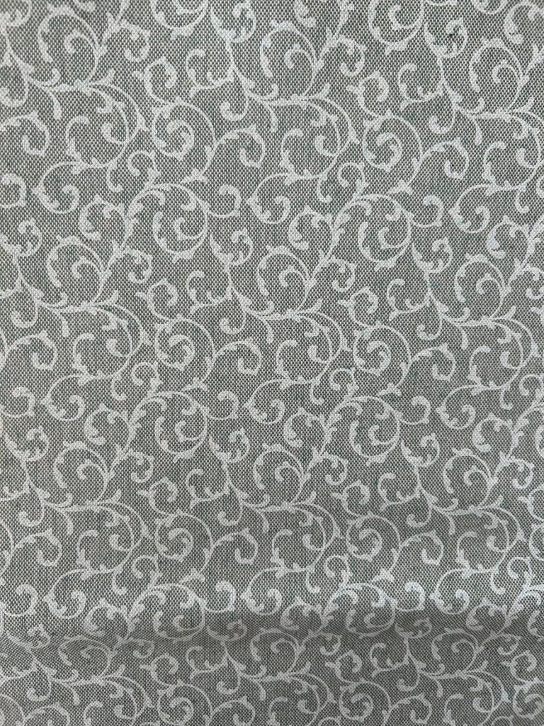 Tela resinada verde motivos blancos